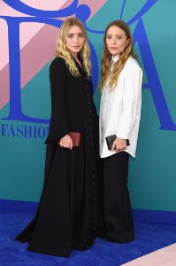 Ashley and Mary-Kate Olsen attend the 2017 CFDA Fashion Awards in NY by Jamie McCarthy / WireImage